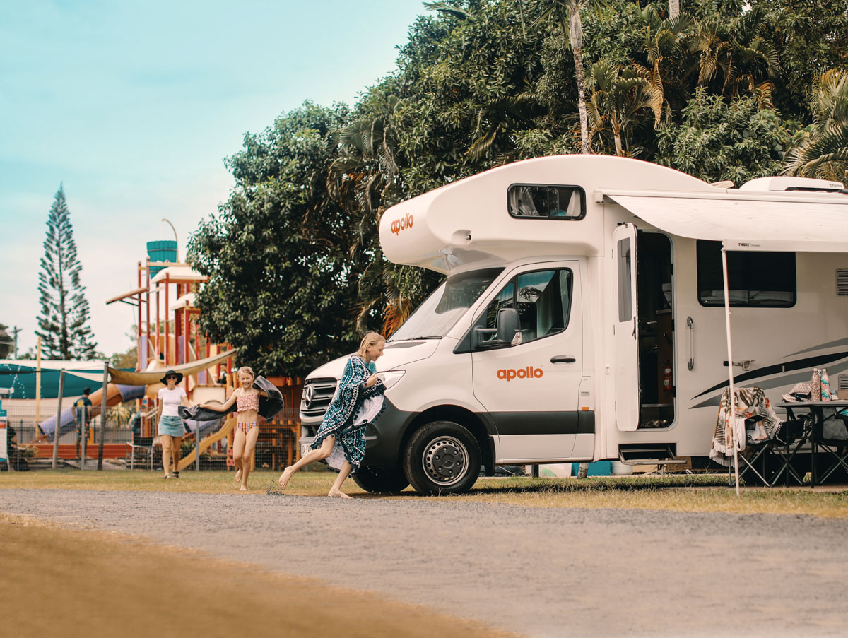 Family with motorhome at campground